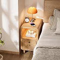 Bedside Table With Orange Lamp Alarm Clock Mobile Phone Books Cups And Drawer In Bedroom