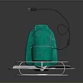 Silver Bladed Electric Fan With Green Base And Metal Guard On Dark Background