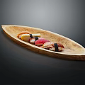 Delicious Assorted Sushi Pieces Artfully Arranged on Wooden Boat Shaped Plate