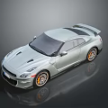 Modern Silver Sports Car Featuring Rear Spoiler And Orange Wheels Exterior Design