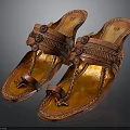 Handcrafted Brown Leather Slippers With Braided Straps And Traditional Design
