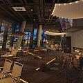 Cozy Outdoor Restaurant Patio With String Lights Wooden Deck Tables And Chairs
