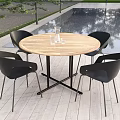 Round Wooden Outdoor Table with Black Chairs Glass Vase on Wooden Deck by Pool