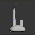 White Electric Toothbrush With Blue Ring And Silver Brush Head On Modern Base