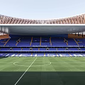 Modern Football Stadium With Green Pitch Blue Stands And Unique Roof Design