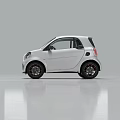 White Compact City Car With Black Roof And Modern Sleek Exterior Design For Urban Driving