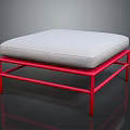 Modern Square Ottoman With Red Metal Frame And Soft Gray Cushion