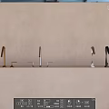 Stylish Faucets with Different Finishes on Light Gray Countertop and Beige Wall