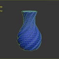 Blue Carved Vase Sculpture With Twisted Texture And Shiny Surface On Dark Background