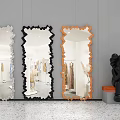 Three Irregular Shaped Mirrors White Black Orange Reflect Clothing Store Interior With Black Sculpture