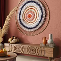 Bohemian Decorative Cabinet On Pink Wall With Round Woven Hanging Shell Decor Vases And Fruits