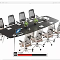 Black Conference Table With Wheeled Office Chairs Green Plants Laptop Documents And Tissue Box