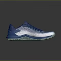 Blue And Silver Athletic Shoes With Knit Upper Green Sole And Red Accents