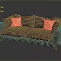 Brown Sectional Sofa with Orange Patterned Cushions and Wooden Legs in Modern Dark Setting