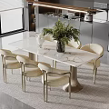 Modern Dining Table Set with Marble Top Beige Chairs and Green Plant in Bright Kitchen