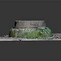 Moss Covered Round Manhole Cover With Square Concrete Base And Gravel