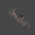 Pink Bicycle With Front Basket And Brown Seat On Black Background