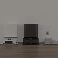 Smart Machines Ecovos Robot Vacuums White Black and Silver on Wooden Floor