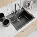 Black Kitchen Sink with Modern Faucet on Marble Countertop and Wooden Cabinets