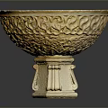 Intricately Carved Stone Bowl With Floral Patterns On Decorative Pedestal Base