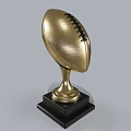 Golden Football Trophy with Shiny Metallic Surface and Black Base for Sports Championship Award