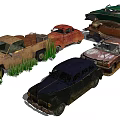 Several Old Rusty Abandoned Cars With Damaged Bodies And Overgrown Grass