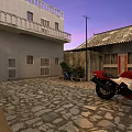 Garden Landscape With Stone Paved Courtyard White Building Tile Roof And Red Motorcycle