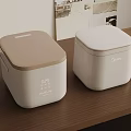 Two Midea Kitchen Appliances With Beige And White Lids Square Design On Wooden Table
