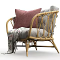 Stylish Wicker Outdoor Chair With Pink Cushion And Floral Blanket For Patio Use