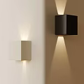Modern Wall Sconces in White and Black Mounted on Wall with Warm Lighting
