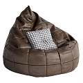 Brown Leather Bean Bag Chair With Stitched Design And Black And White Houndstooth Pillow