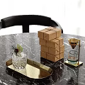 Stacked Brown Paper Boxes With Glassware Golden Funnel And Gold Tray On Marble Tabletop