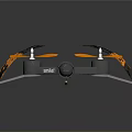 Sleek Black And Orange Quadcopter Drone With Rotating Propellers And Protective Frame 3d model