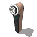 Handheld Medical Device With Circular Treatment Head Brown And Black Body Buttons And Indicator Light