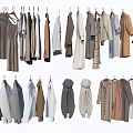 Variety of Clothes Hanging on Racks with Different Styles and Neutral Colors