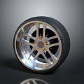 Car Wheel Featuring Silver Rim Design Black Tire And Yellow Bolts