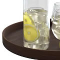 Fresh Lemon Water in Glass Bottle with Ice Cubes and Glasses on Wooden Tray