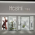 Hesini Clothing Store Front With Glass Window Display And Fashion Mannequins