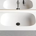 Sleek Modern Bathroom Washbasin Design With Countertop Faucet And Cabinet Lighting