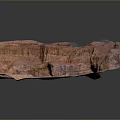 Red And Orange Rock Canyon Landscape With Layered Formations And Natural Caves