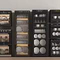 Modern Black Kitchen Appliances With Glass Doors Storing Dishes Cups And Bowls