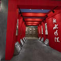 Modern Exhibition Space With Red Walls White Display Boards And Glass Cases