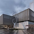 Modern Library Building With Sleek Metal Facade Front Tree Sculpture Plaza Outdoor Seating Cloudy Sky