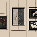 Stylish Framed Decorative Paintings With Various Designs Hanging On Beige Wall