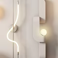 Modern Wall Lamps With Various Contemporary Designs Mounted On White Panel