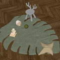 Leaf Shaped Green Rug on Wooden Floor with Wooden Toys White Chair and Star Pillow
