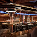 Modern Bar Interior Design With Sleek Counter Comfortable Seats And Ambient Lighting