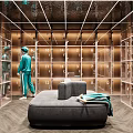 Luxurious Modern Walk in Closet with Glass Front Lockers and Comfortable Seating Sofa