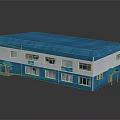 Two Story Office Building With Blue Roof White Walls And Multiple Windows