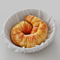 Fresh Golden Flaky Croissant in White Cloth Lined Basket on Neutral Background